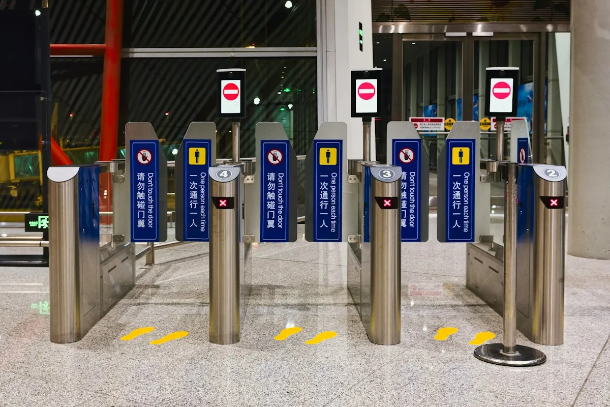 Automated security gates at the entrance of a modern office building